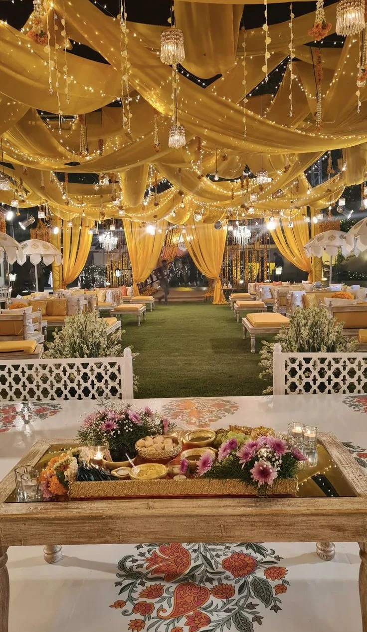 A bright canopy setting for a dholki celebration in Lahore